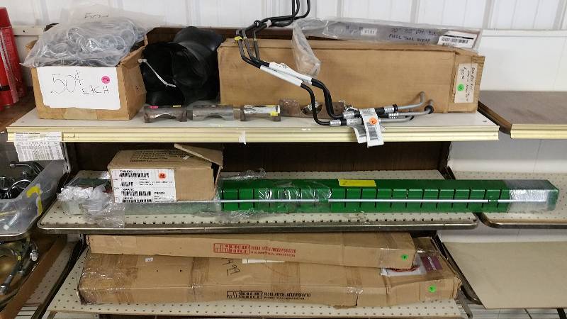 lot 14 image: Hitches, Fuel Tank Strap, Brackets, Etc.
