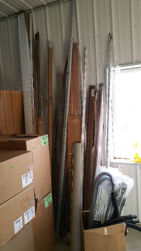 lot 26 image: Wood and Vintl Trim, Vacuum Hoses, Etc.
