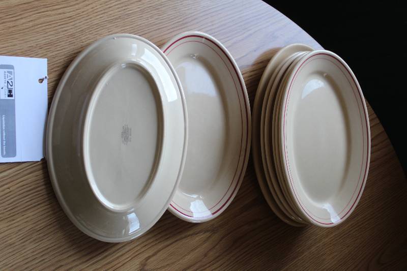 lot 137 image: Lot of (8) Sterling Desert Tan Vitrified China 11.5x8in. Serving Plates