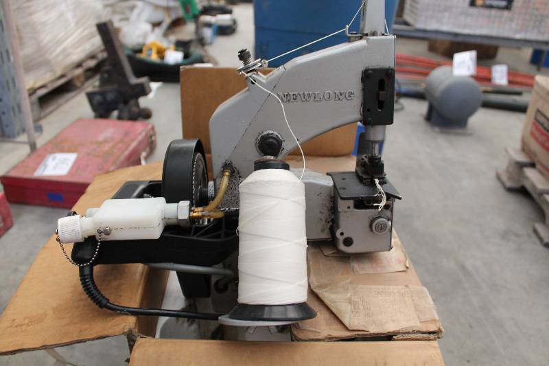 lot 740 image: Newlong Bag Closing Machine