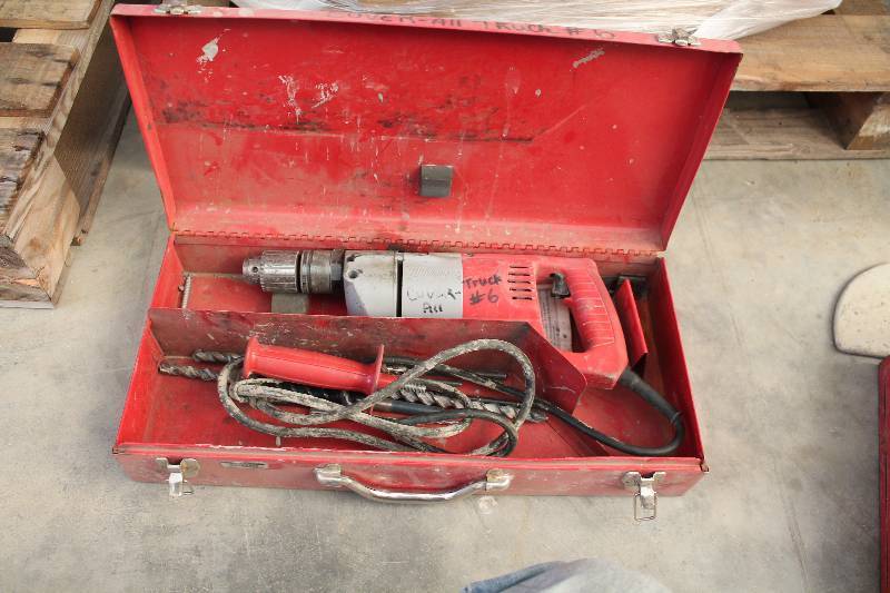 lot 738 image: Milwaukee Tools Heavy Duty 12in. Hammer Drill w Bits, Case