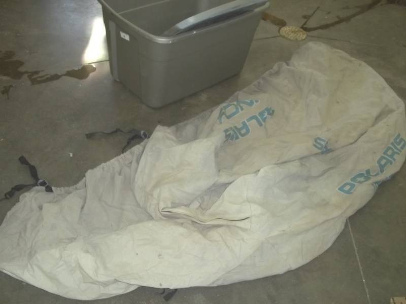 lot 16 image: Polaris snowmobile Cover and storage tote with lid