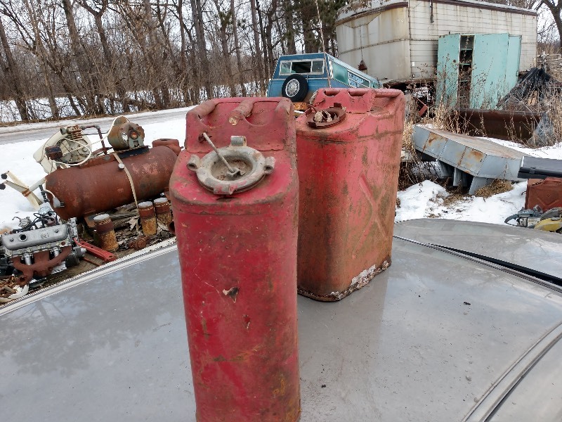 lot 12 image: Antique Red Military Army Gas Tanks (2)