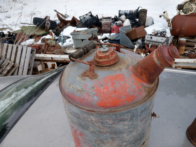 lot 14 image: Antique Red Military Army Gas Tank and Galvanized Silver Gas Can