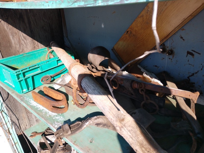 lot 84 image: Teal Parts Bin and Contents, HorseOx Yoke-Like Bar, Chain, Wonder Dust Bottle, and Blue Fan 