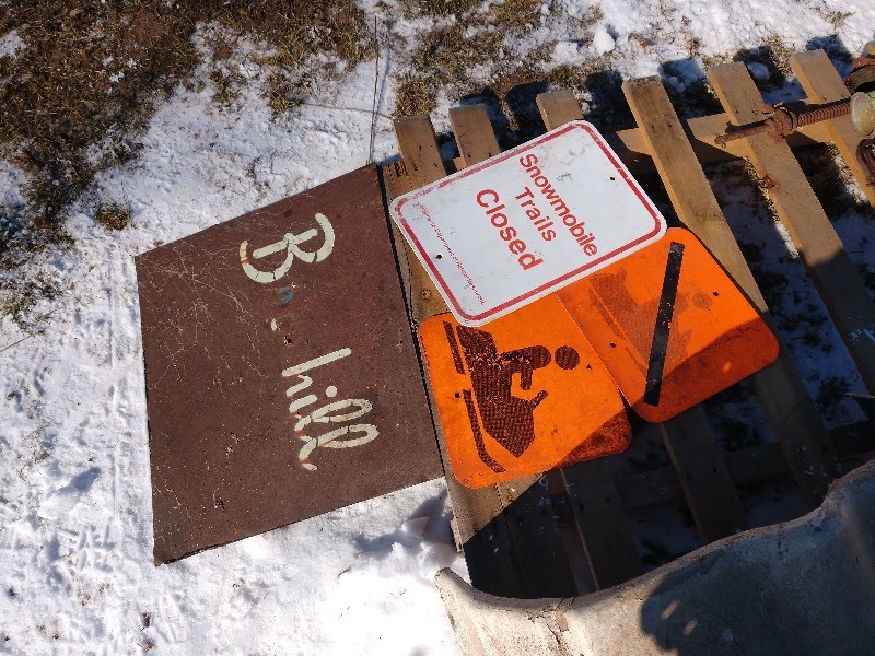 lot 95 image: Snowmobile Trails Closed Sign, Orange No Snowmobiles Sign, Orange Snowmobile Sign, Brown Broshill Sign