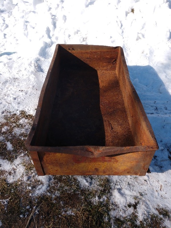 lot 108 image: Metal Tub Labeled Oil