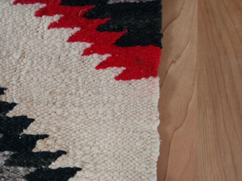 lot 130 image: Antique Navajo Saddle Blanket