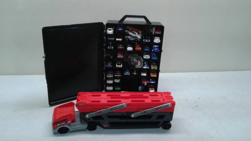 Hotwheels Case And Semi Truck, Case Has Different Types Of Cars In Them