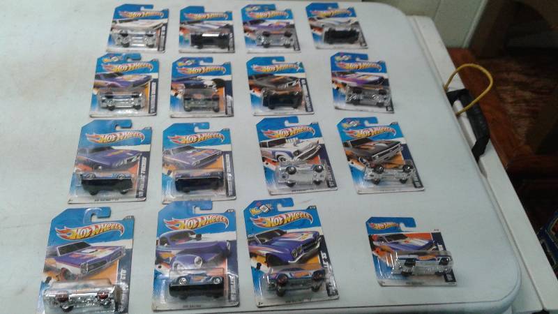 Lot of 16 Hot Wheel Cars New In The Package, Package May Show Minor Wear, HW Racing