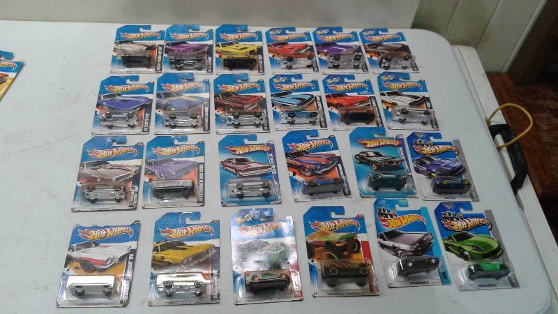 Lot of 24 Hot Wheels Cars, New In The Package, Package May Show Minor Wear