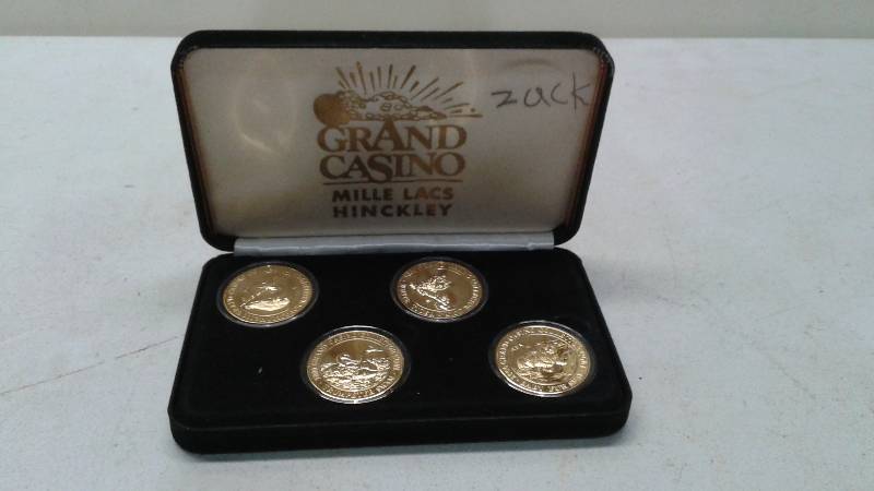 Set Of Grand Casino Collector Coins, Wildlife, Some Wear To Case