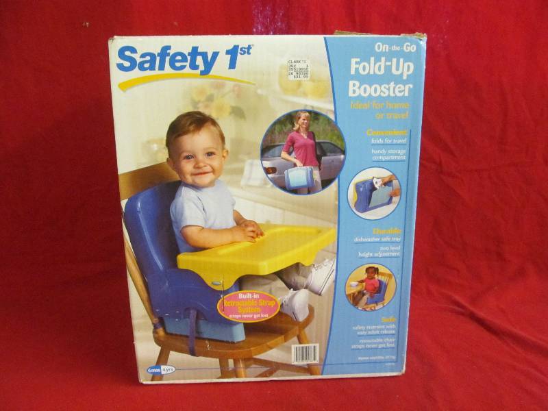 lot 16 image: Safety First fold up booster
