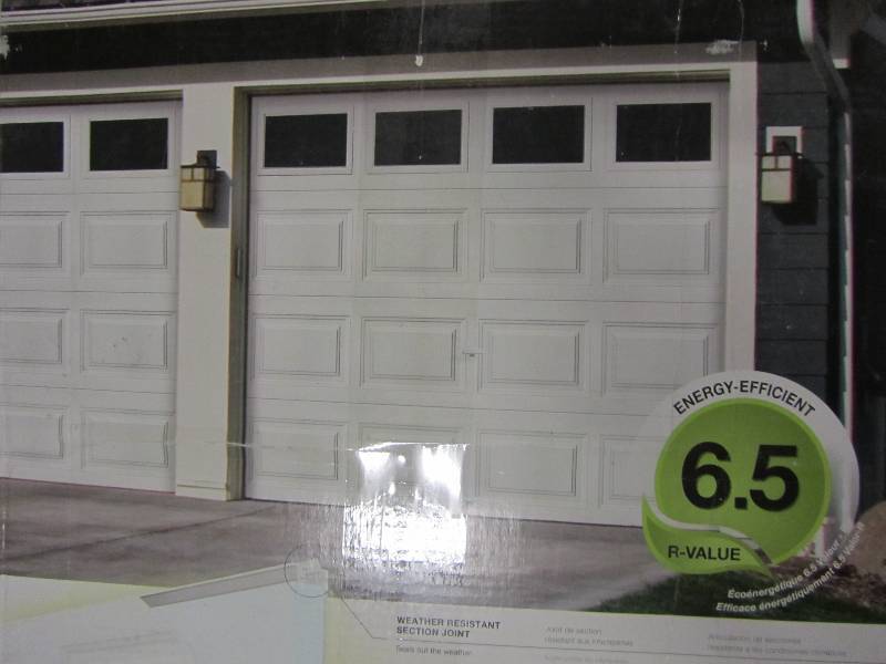 lot 4 image: Clopay HDP13_SW_Plain Premium Series 8 ft. x 7 ft. 12.9 R-Value Intellicore Insulated White Garage Door with Plain Windows