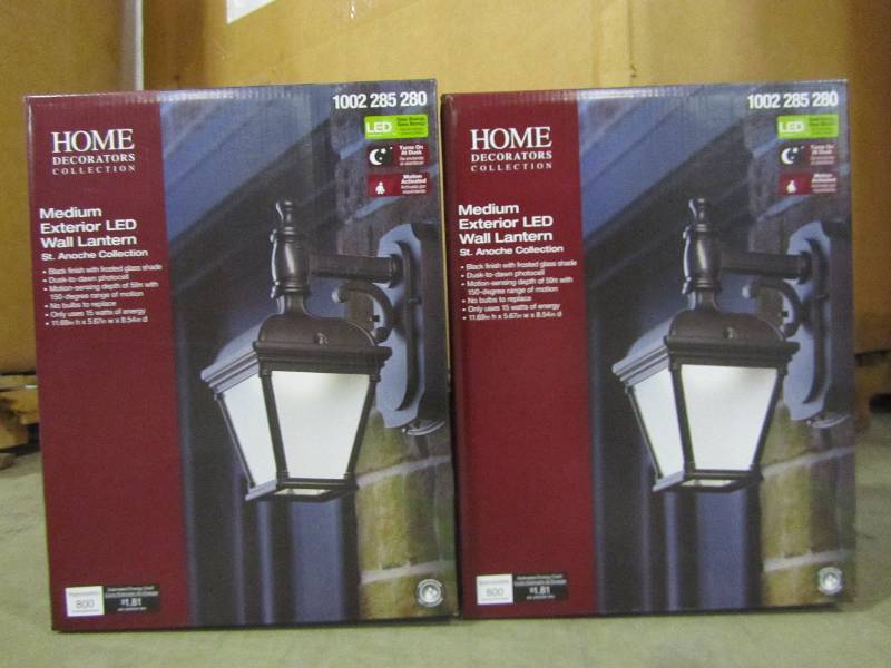 lot 25 image: 1-Light Black Motion Activated Outdoor Integrated LED Wall Mount Lantern (x2)