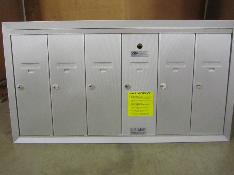 lot 63 image: Salsbury Industries Aluminum Surface-Mounted USPS Access Vertical Mailbox with 6 Doors