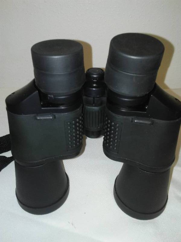 lot 6 image: OPTIC 1050 Binoculars with case, Excellent Condition