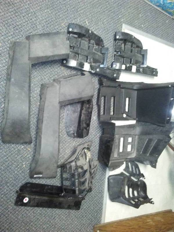lot 63 image: Misc. NEW ATV ABS Parts, fenders, light guards and more
