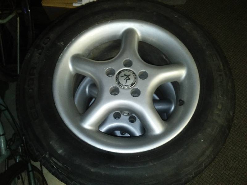 lot 128 image: Eldorado Tires (4) American Racing Alloy Rims