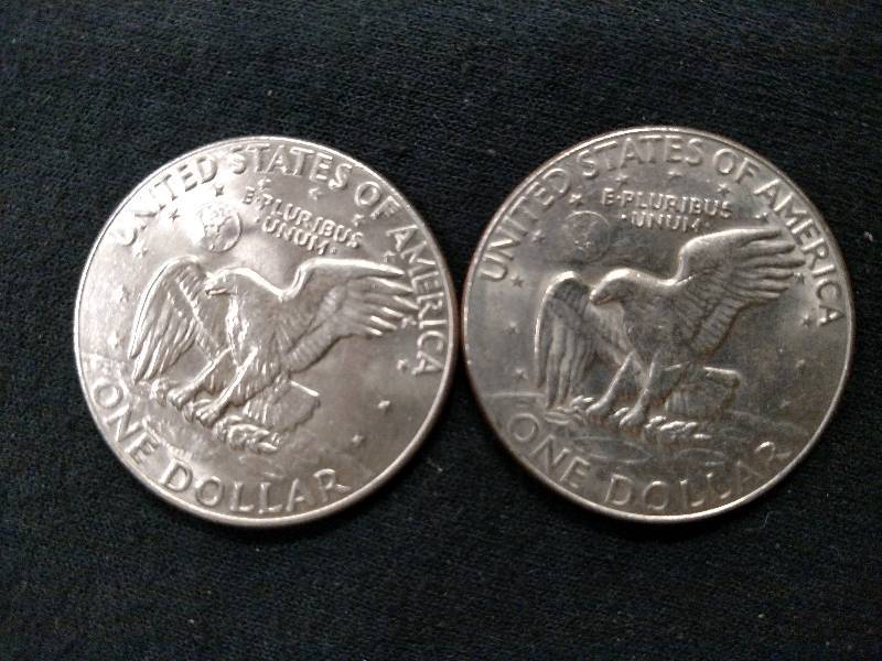 (2) Ike Dollars