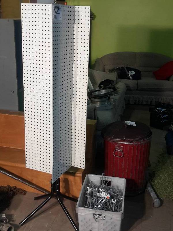 rotating Pegboard shelf.. 24in w x 67 in h