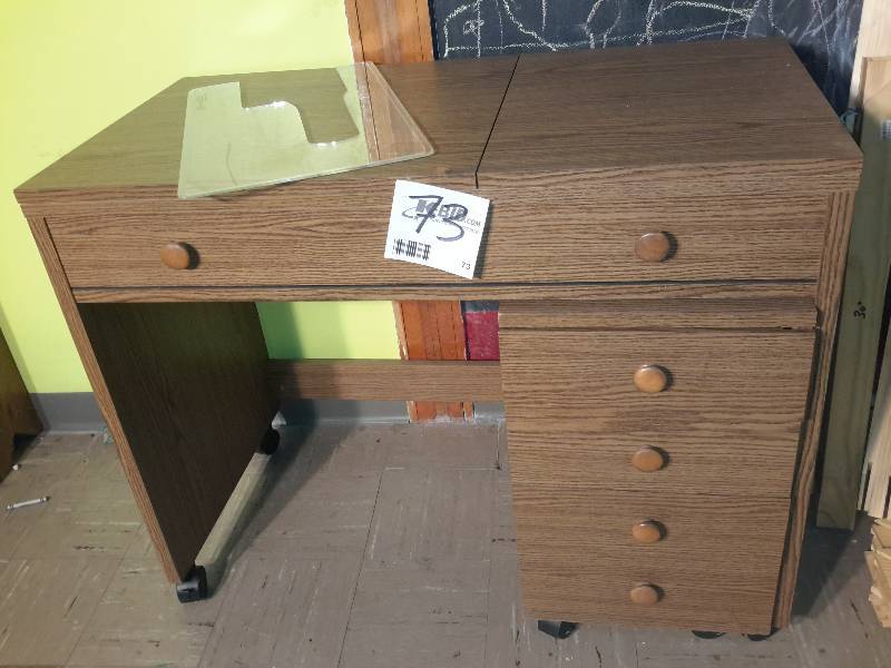 Magic Sewing Center.  Put your own sewing machine in this.