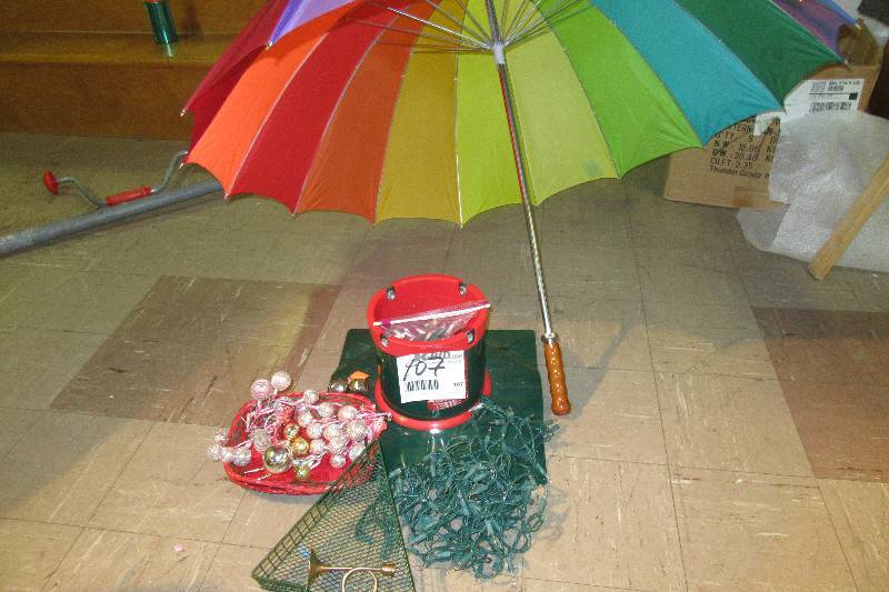 Nice Christmas Tree stand.. Self watering  lights.. Nice Rainbow Umbrella.. Very good shape