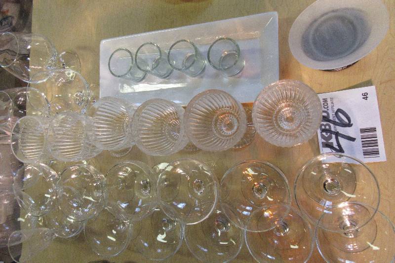 A lot of fancy glassware.   5 Short Sherbets  5 Tall Sherbets  Set of 4 cordials with serving tray 3 snifters, 5 water glasses