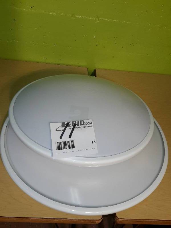 . Disc-shaped fluorescent ceiling lights small is 17 in diameter x 5 h large is 21 in diameter x 5 h