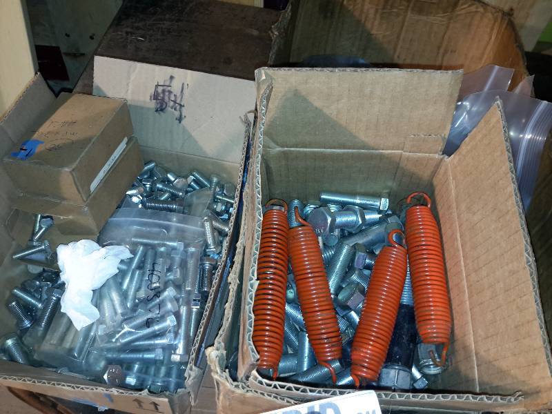 Nuts bolts and Springs (springs look like they might be Trampoline springs if you are missing some.