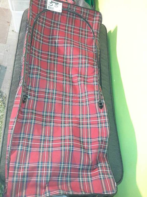 Red plaid garment bag 21 in x 5 x 50 h (not including hook)