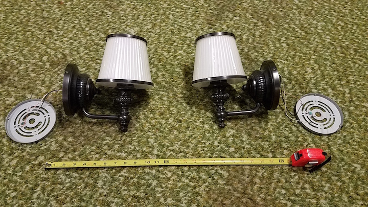 The two traditional glass sconces are 9 in deep x 10 in h 5.5 in fitter  The two contemporary brushed nickel sconces are 8.5 in h x 5.25 wide x 6 deep, 4.5 in fitter 60W max, candelabra bulbs