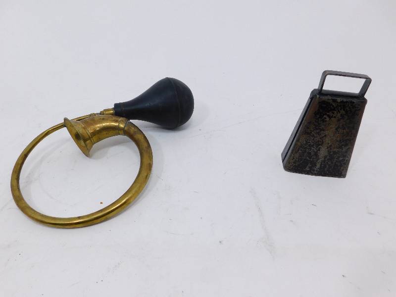 lot 68 image: Vintage Model T Brass Horn and a Cow Bell