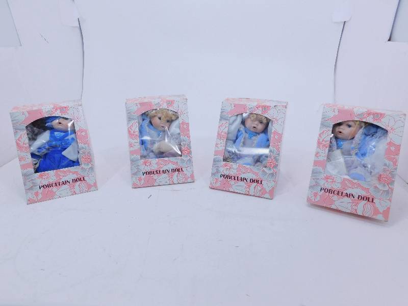 lot 133 image: 4 Porcelain Dolls