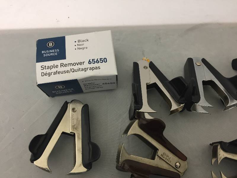 lot 62 image: 12 Staple Removers