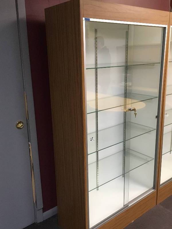 lot 2 image: Lighted Locking Glass Cabinet