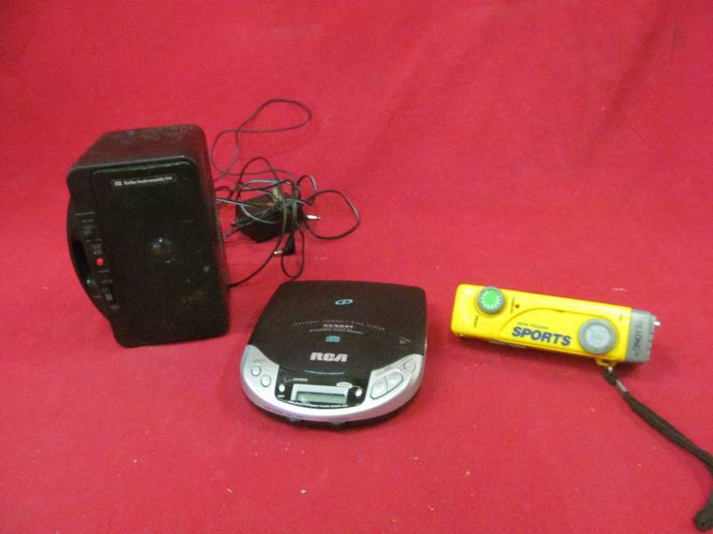 lot 18 image: RCA compact disc player, speaker, sports radio