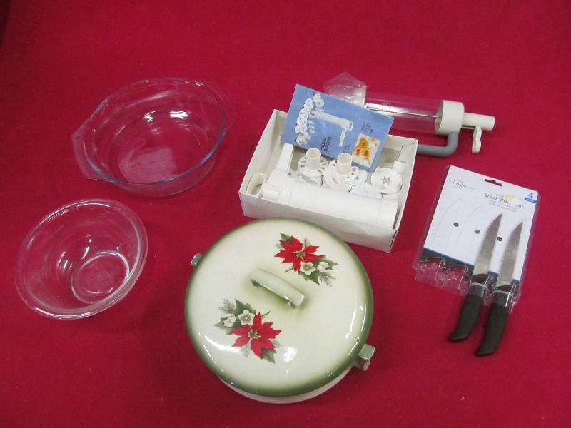 lot 23 image: cookie press, knives, Pyrex bowls, serving dish