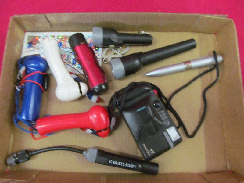lot 45 image: handheld fans, flashlights, camera,booklight