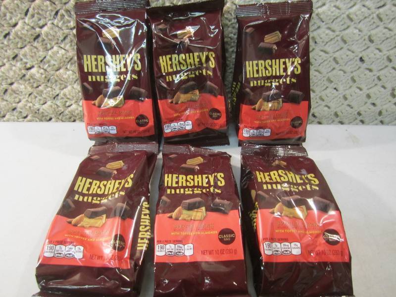 lot 209 image: Lot of 6 Bags Hersheys Nuggets Spec...