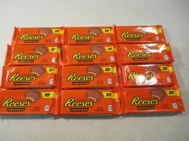lot 239 image: Lot of 12 Reeses Peanut Butter Cups...