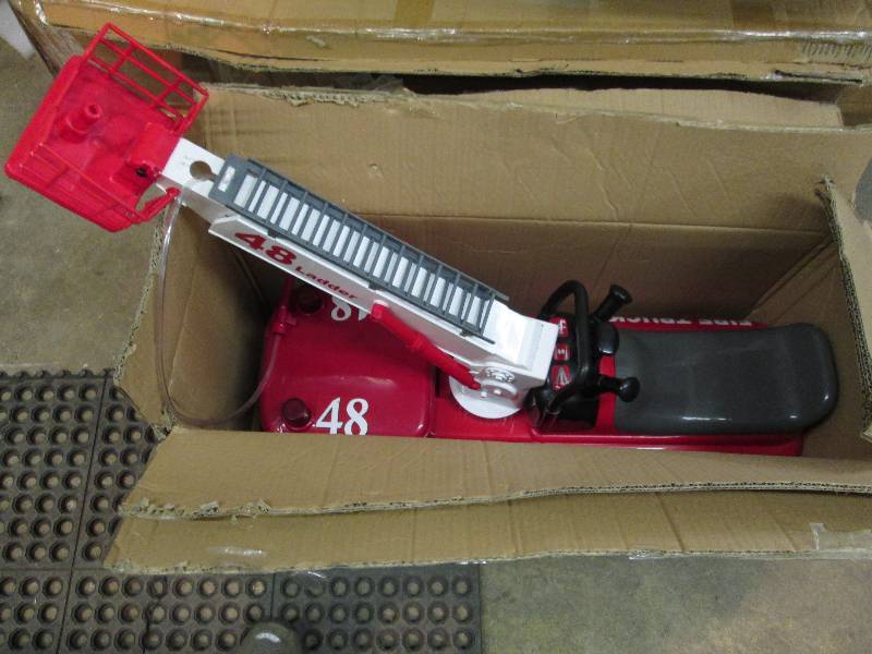 lot 7 image: Action Fire Engine Ride-on Toy open...