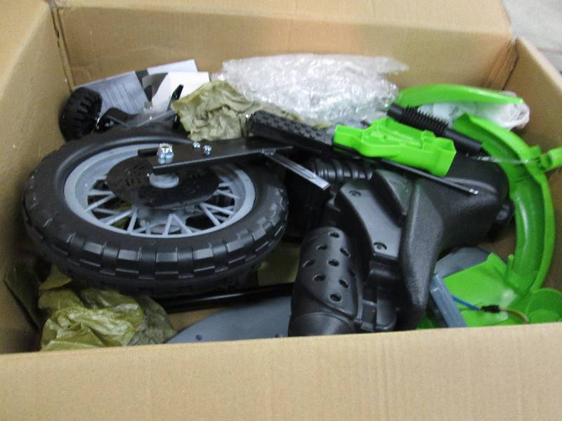 lot 8 image: Green Motorcycle open box, untested...