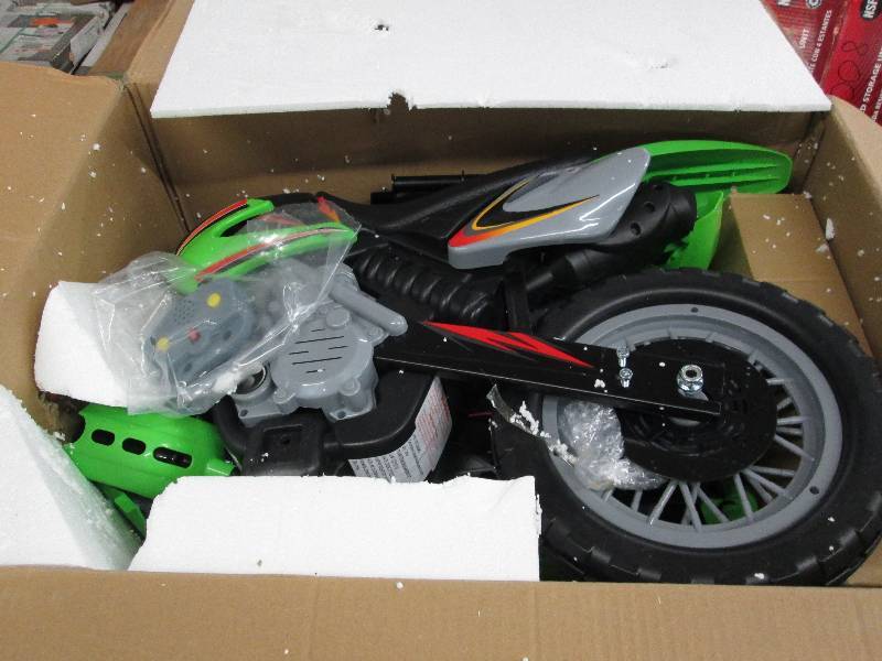 lot 35 image: Green Motorcycle open box, untested...