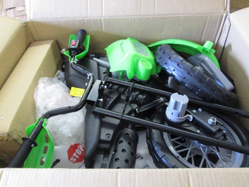 lot 98 image: Green Motorcycle open box, untested...