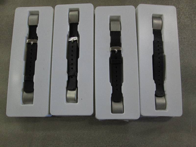lot 157 image: Lot of 4 FitBit Alta Bands open box...