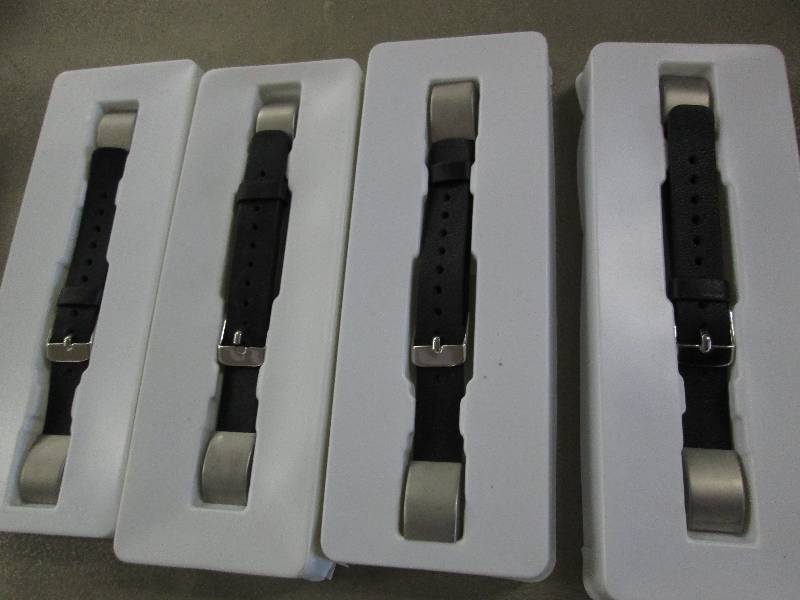 lot 158 image: Lot of 4 FitBit Alta Bands open box...