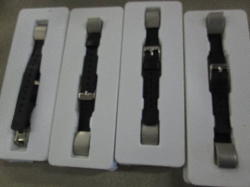 lot 160 image: Lot of 4 FitBit Alta Bands open box...