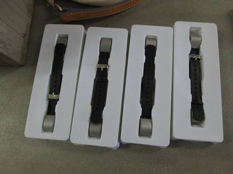 lot 161 image: Lot of 4 FitBit Alta Bands open box...