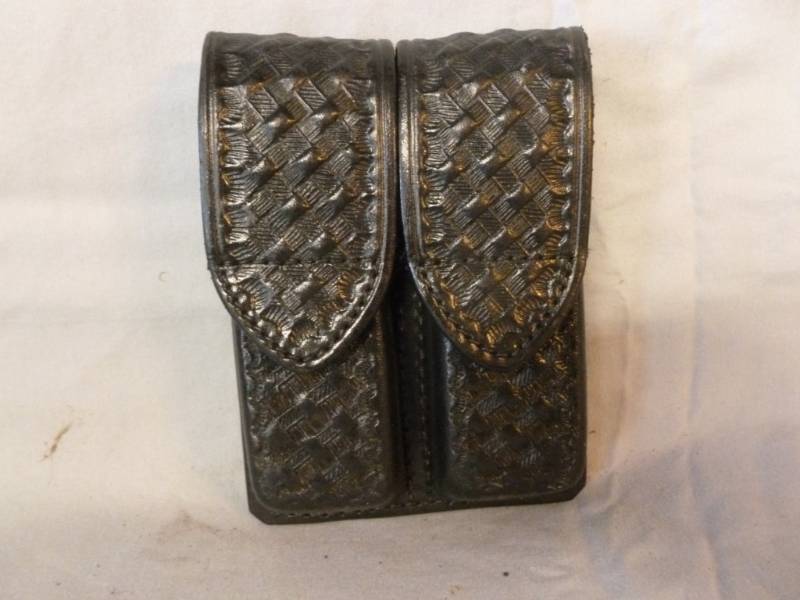 lot 62 image: Pistol Clip Holder